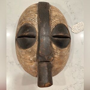Hand-Carved Tribal Decorative Mask in Brown and Cream